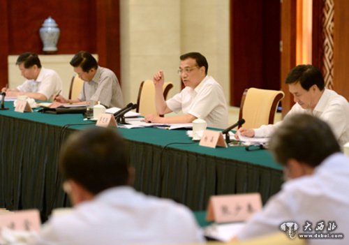 2013年7月9日，李克强总理在广西主持召开部分省区经济形势座谈会，首次对“合理区间”作出具体阐释。新华社记者 马占成 摄